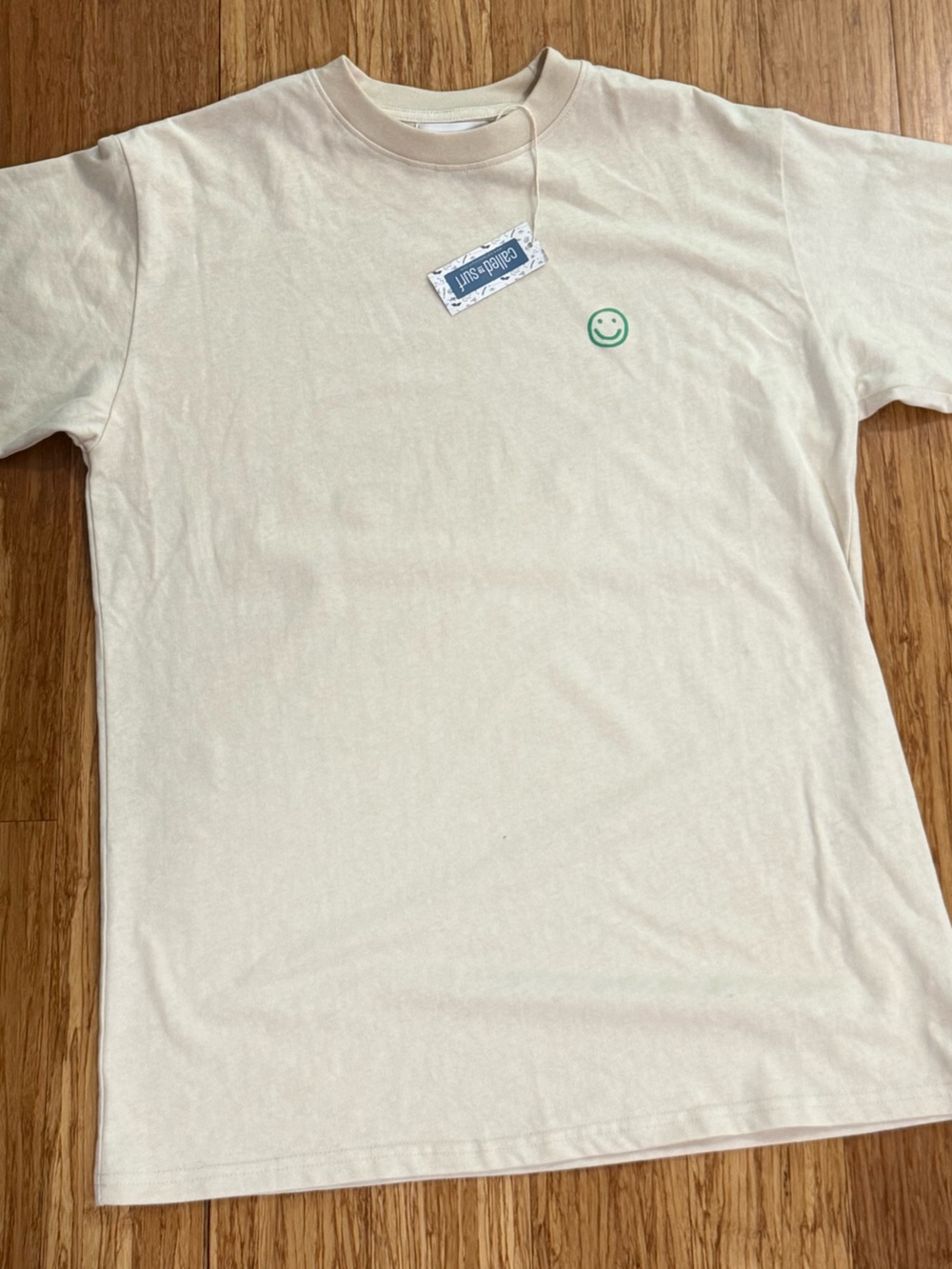 NWT Smiley Logo Tee